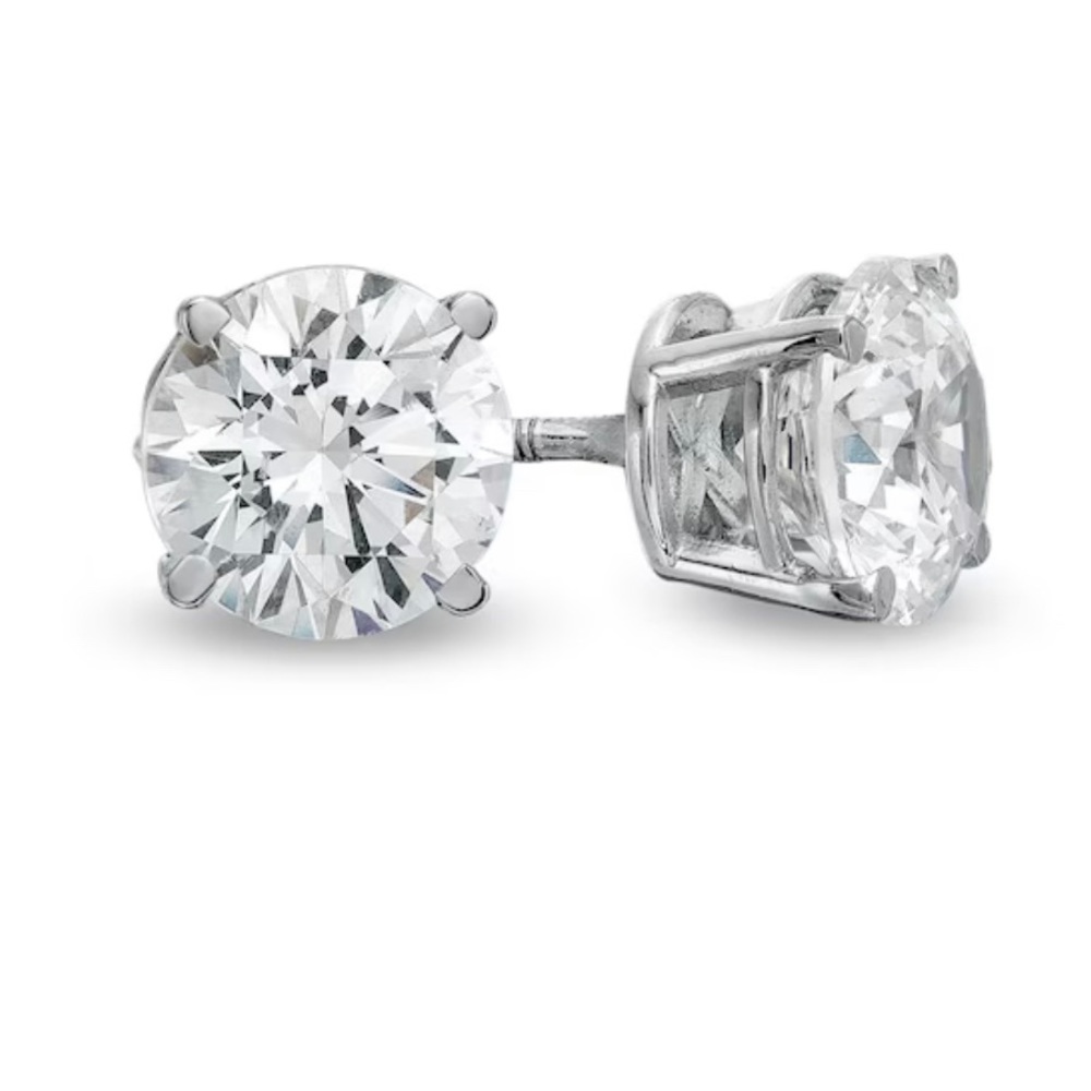 2 carat from peoples. Open to trades of gold jewelry, designer bags, & shoes.